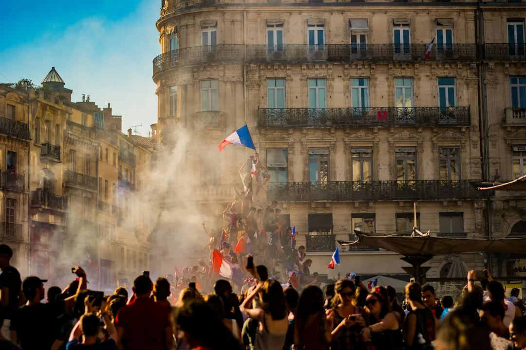 Paris police confront violent protesters amidst burning cars and looted shops during demonstrations against rising living...