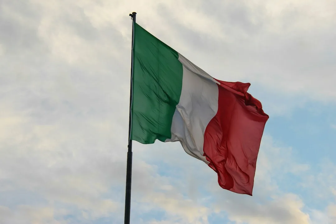 Symbolic image of extradition, showing a transfer of an individual between Italian and U.S. legal representatives.